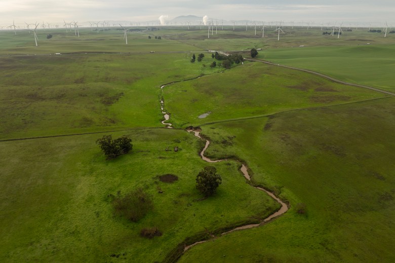 Land where California Forever plans on building its new city (foreground) in Solano County, Feb. 16, 2024. The contentious development would be located between Travis Air Force Base and Rio Vista. Photo by Loren Elliott for CalMatters