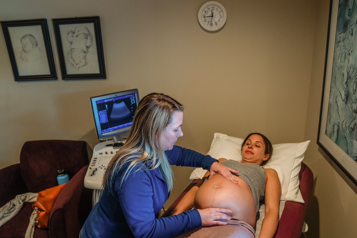 Sally K., right, thirty-eight weeks pregnant, talks to midwife Andrea Bergleen, left, during a check-up at the Best Start Birthing Center in San Diego on March 20, 2024. Photo by Ariana Drehsler for CalMatters