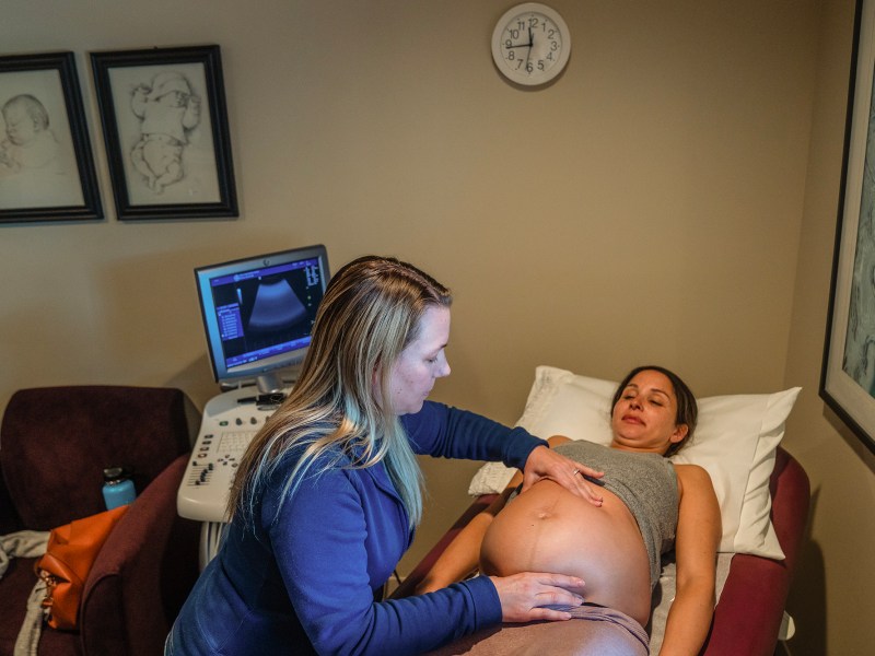 Sally K., right, thirty-eight weeks pregnant, talks to midwife Andrea Bergleen, left, during a check-up at the Best Start Birthing Center in San Diego on March 20, 2024. Photo by Ariana Drehsler for CalMatters