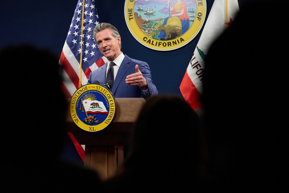 Gov. Gavin Newsom addresses the media during a press conference unveiling his revised 2024-25 budget proposal at the Capitol Annex Swing Space in Sacramento on May 10, 2024. Photo by Fred Greaves for CalMatters