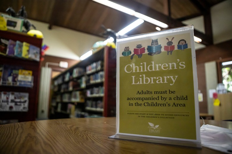 Book shelves lined up in the Fresno County Library Clovis Branch on July 31, 2024. Photo by Larry Valenzuela, CalMatters/CatchLight Local