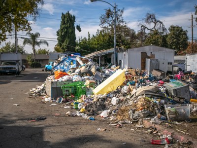 Garbage piles at Stockton Park Village in Stockton on Nov. 22, 2022. Photo by Rahul Lal, CalMatters.