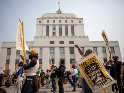 Supporters attend a Moms 4 Housing Board of SuperMOMS protest outside the County of Alameda Administrations building in Oakland on Sept. 1, 2020 following the passage of an emergency measure to block evictions until the end of January amid the pandemic. Lawmakers Photo by Anda Chu, Bay Area News Group