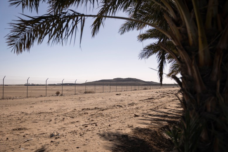 The South Yuma County Landfill is visible from a neighboring organic date farm in Yuma on Nov. 29, 2022. Photo by Miguel Gutierrez Jr., CalMatters